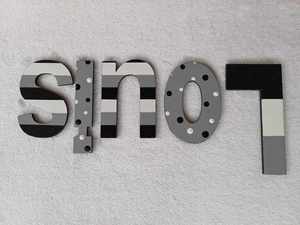 8 Names Suitable For Doors: Louis - small letters suitable for a door.