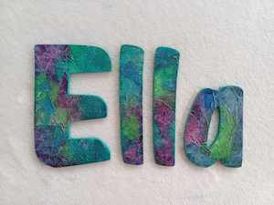 Ella - small letters suitable for a door.