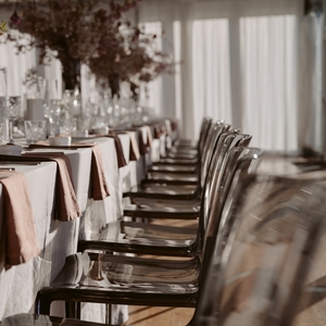 Products: Acrylic Chair - Smokey Ceremony Chairs Hire Wanaka