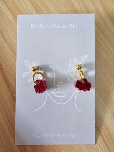 Jewellery: Red bow gold studs