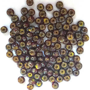 Czech Seed Bead: 83190-43400 - Brown Picasso stripe - size 6