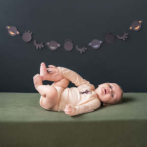 Merino long sleeve bodysuit in soft peach Mello Merino