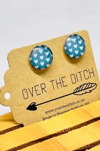 Over The Ditch: Blue With White Hearts Studs