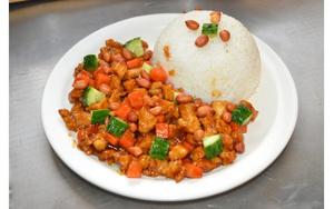 Hot and spicy chicken with peanut on rice