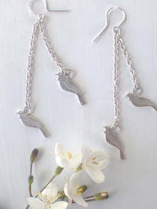 Accessories: Double Tui earrings