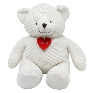 Adorable white teddy bear with red love heart