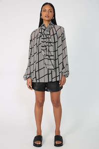 Style Steals: area long sleeve top / black|cream multi spot