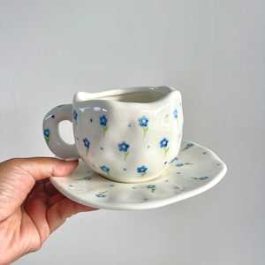 Handmade clay mug - Blue flower with saucer