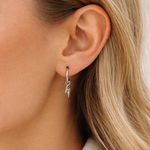 Earrings: Karen Walker Bolt Earrings