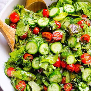 Order Food For Christmas: Christmas Green leaves, heirloom tomatoes, cucumber, avocado, feta and lemon vinaigrette - serves 4 people