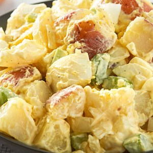 Order Food For Christmas: Christmas Classic potato salad with crispy bacon, spring onion, boiled eggs and mayo - serves 4 people