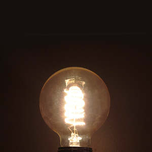 G80 Amber Glass Spiral Filament 4W 3000K Dimmable E27 Light Bulb