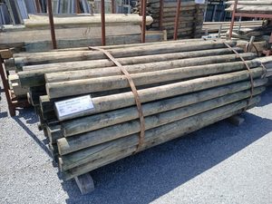 Products: Pine Round H4 Post 90-120mm x 2400mm Long Musgroves