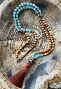 Mālā with Lake Blue Agate and Pearwood Beads with a Nepalese Silver Guru Bead,&hellip;