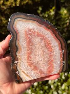 Carnelian: Carnelian Agate Slice with engraved Buddha on a Lotus