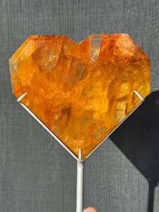 Golden Healer Quartz Faceted Heart on a stand