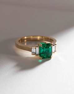 Bespoke Collection: Step Cut Emerald Flanked with Diamond Baguettes