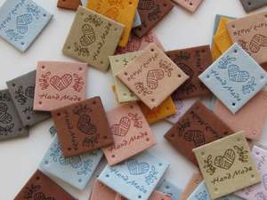 8 Mixed Colour Heart with wool wrapped around Hand made PU leather labels. 25 x 25mm