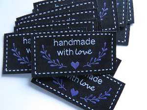 Labels: 25 Black Handmade with Love in white font labels with heart and branches in purple 50mm wide x 25mm high