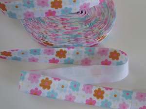 4.7m Mixed colour daisy like flowers on whte background Fold Over Elastic FOE Foldover 15mm