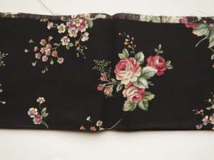 1/8th yard Approx. 56cm x 23cm Rose print on black cotton