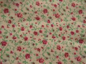 1.65m mini rose print on cream background 100% cotton 112cm wide.
