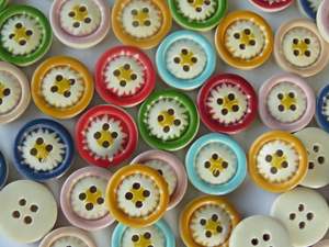 Buttons: 24 Mixed Colours on Edge Flower in centre 4 holes 15mm diameter buttons