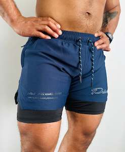 Shorts: PRIMAL PERFORMANCE 2-IN-1 COMPRESSION SHORTS
