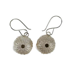 Tina De Suza: Sterling Silver Kina Necklace or Earrings