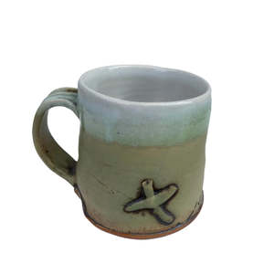 Yellow Cup with X and Man