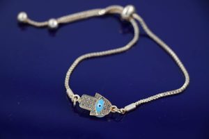 Turkish Evil Eye Bracelet With Hamsa Hand Pale Blue Colour Eye In Gold B109b
