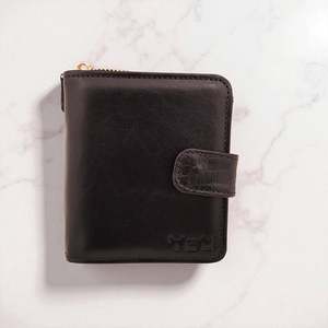 Genuine Leather: Woman’s Genuine Leather Button Tab Zip Around Wallet - Black