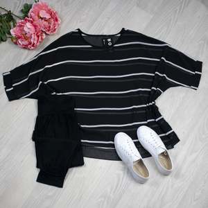 Draped Tops: B&W Stripe Draped Top - Vogue Collection