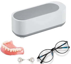 Binoculars: Ultrasonic Denture and Braces Cleaner