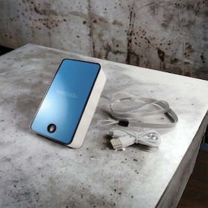 All Items 12: Mini Cooling Fan - USB Rechargeable