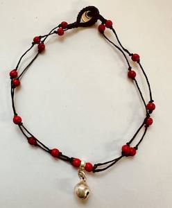 Anklet beads on string with jingle bell