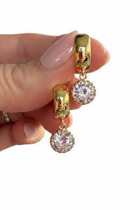 Sparkly rounds on Gold Huggies