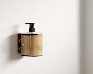 Addition Studio: Addition Studio Bottle Holder | Brass