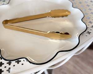 Table: Gold Tongs
