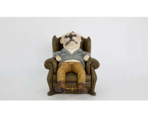 Birds: Bulldog statue on chair