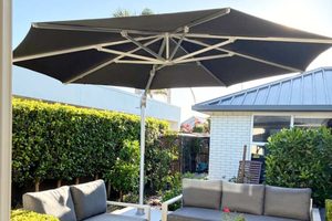 Cantilever Umbrellas: 3.5M Round Cantilever Sunbrella Umbrella in 'Coal' - Outside Space