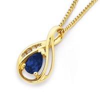 Pendants: 9ct synthetic sapphire &amp. Diamond pendant