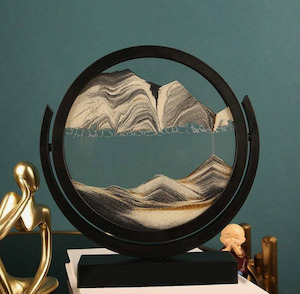 Home Decorating Interior Design: Sand Picture In Black Frame Round