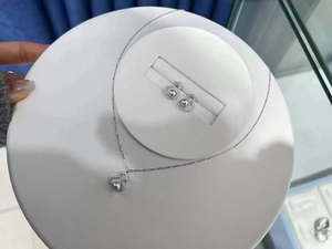 Akoya Pearl Necklace and Earrings with Wulu Design