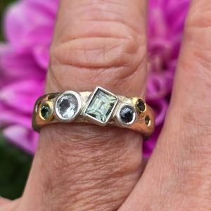 Products: The Gathering ring. 9ct gold, sterling silver, Madagascan sapphires, and white topaz. Size Q - Penelope Barnhill Jewellery