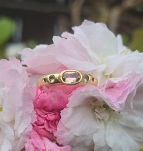 Products: Untreated Imperial topaz ring, 18ct gold with two small pink sapphires. Size M - Penelope Barnhill Jewellery