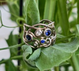 Products: Vine ring. white gold pale platinum mix, diamonds and Ceylon sapphires. Size 0 - Penelope Barnhill Jewellery