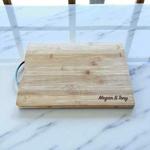 Personalised Unique Christmas Gifts: Personalised Bamboo Chopping Board Anniversary Gift