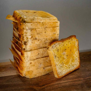 Frozen: Olive Oregano BreadGF/DF/EF paper between each slice FROZEN