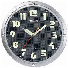 Rhythm: Super Luminous Silver cased domed glass Rhythm Clock